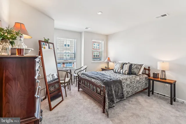 a living room with lots of gym equipment