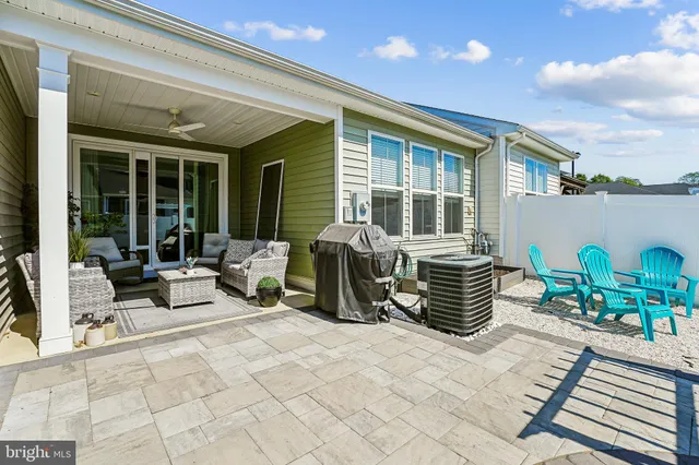 a bed room with a bed and a television