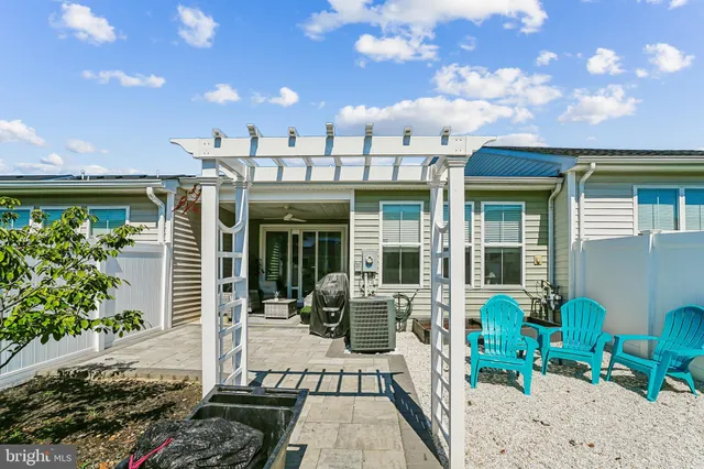 a view of a chairs with a backyard