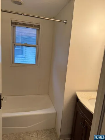 a bathroom with a bathtub