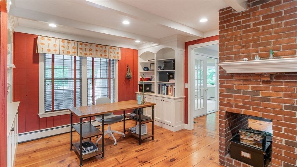 142 Baker Street Walpole, MA 02081 - Photo 19 of 42 a workspace with furniture and a window