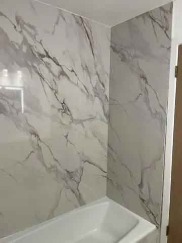 a room with furniture and a chandelier