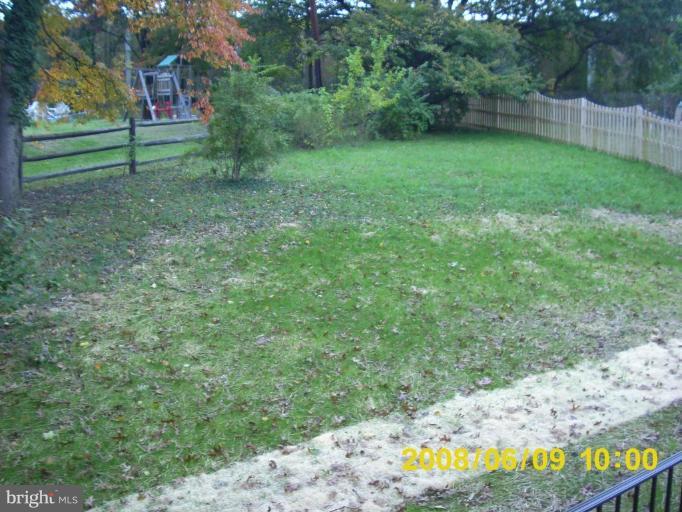 5628A Oakland Road, Unit A Halethorpe, MD 21227 - Photo 5 of 6 a view of a yard with a tree