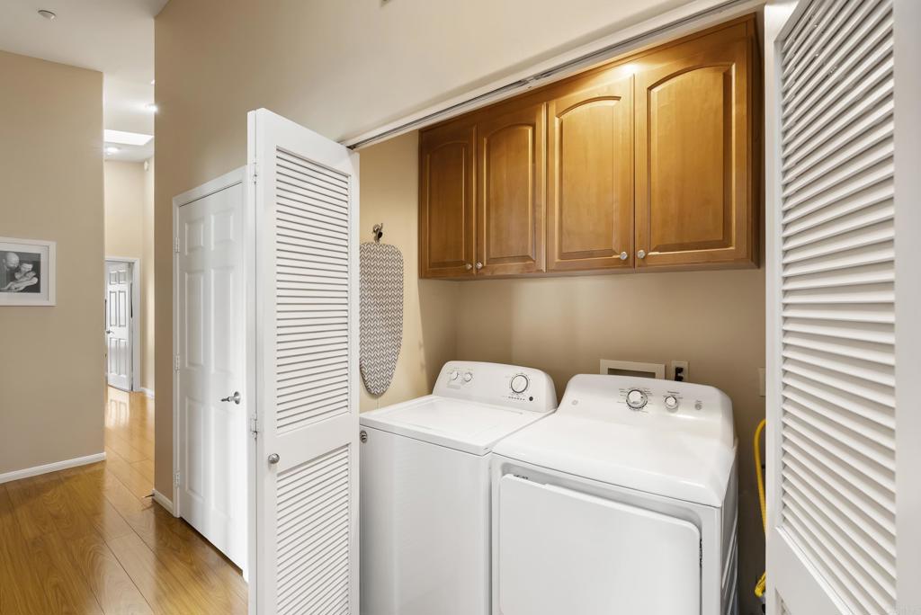 535 F Avenue, Unit 4 Coronado, CA 92118 - Photo 45 of 48 a utility room with dryer and washer