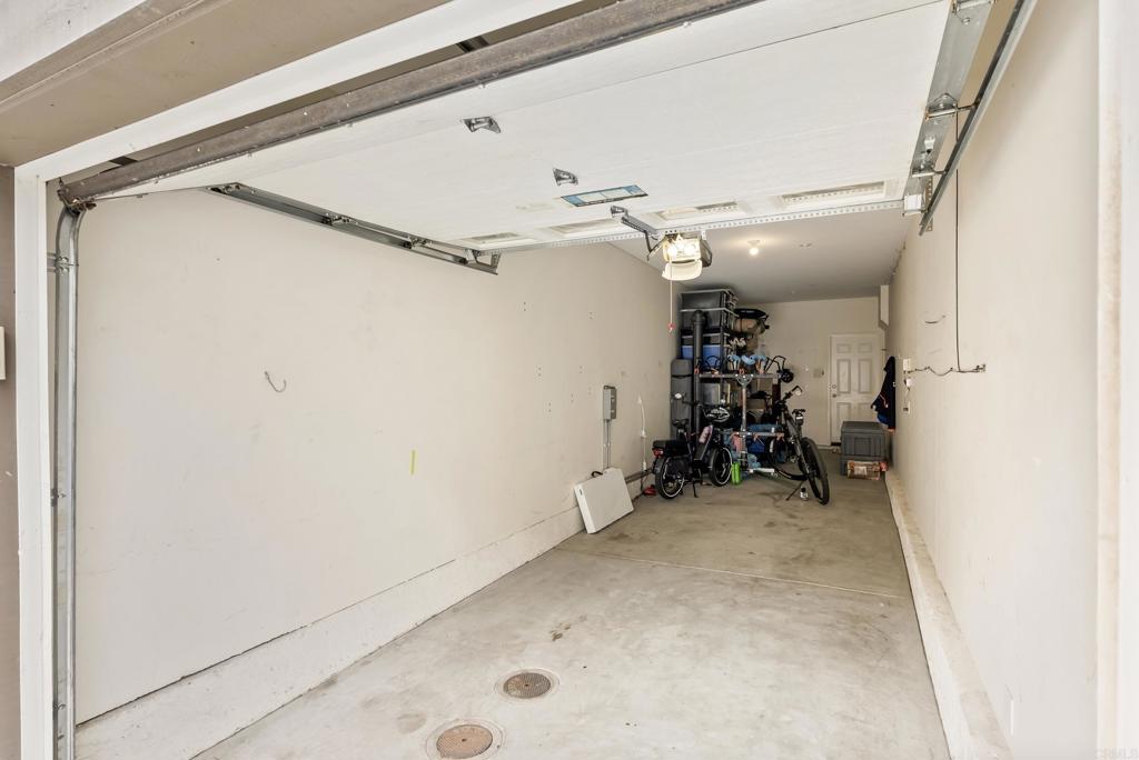 535 F Avenue, Unit 4 Coronado, CA 92118 - Photo 47 of 48 a view of a garage with rack and a white door