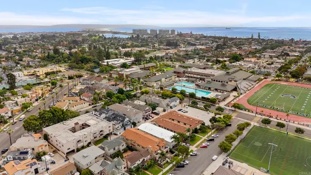 an aerial view of residential building and city view