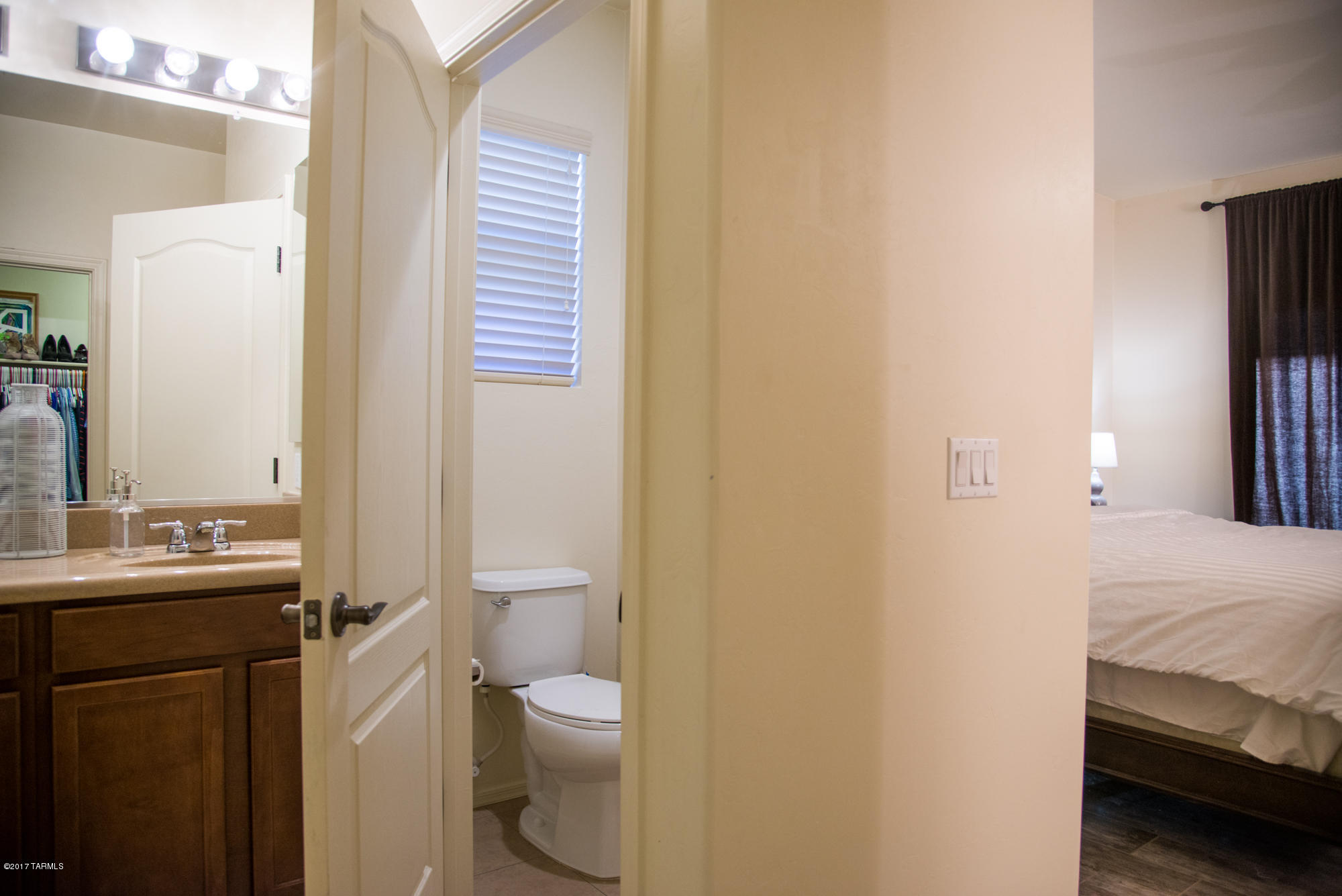 4405 West Crystal Ranch Place Marana, AZ 85658 - Photo 27 of 44 a bathroom with a sink and a toilet