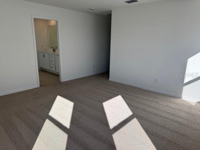 17727 Sharp Pummelo Alley Winter Garden, FL 34787 - Photo 14 of 19 a view of an empty room and window