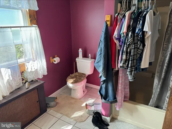 a storage room with washer and dryer