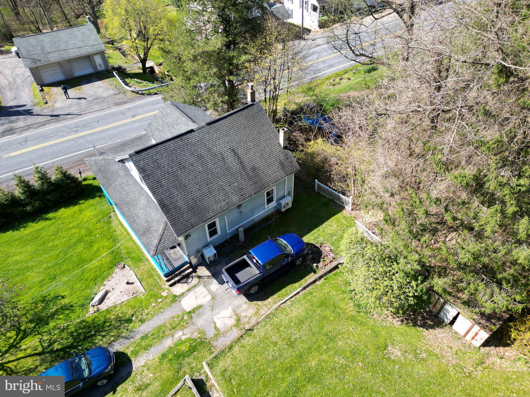 690 High Road Ashland, PA 17921 - Photo 33 of 35 an aerial view of a house with a yard and lake view