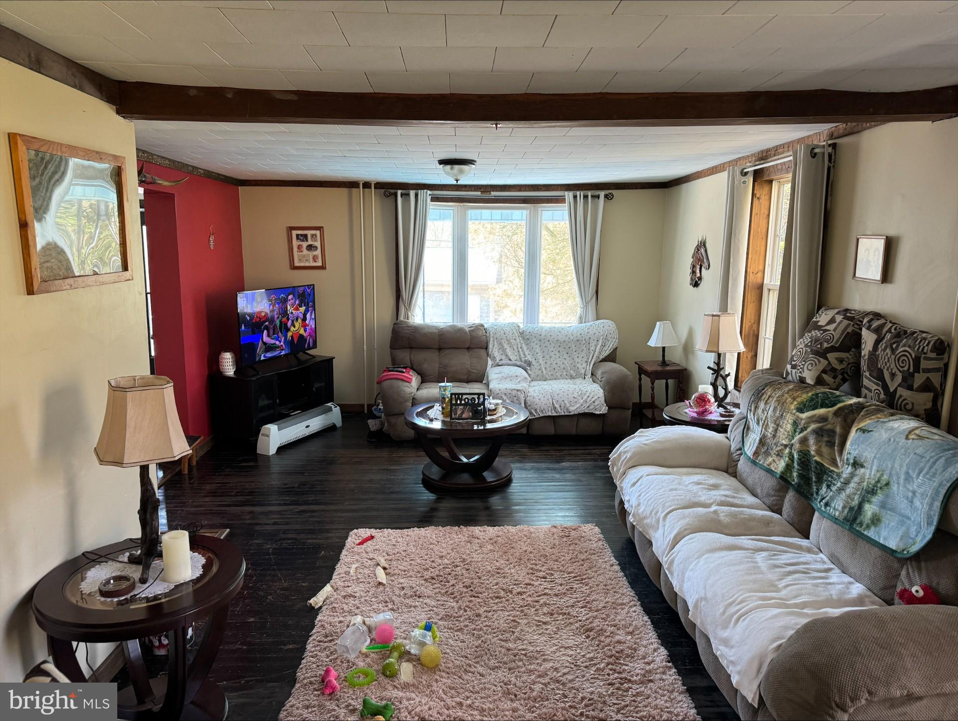 690 High Road Ashland, PA 17921 - Photo 8 of 35 a living room with furniture and a flat screen tv