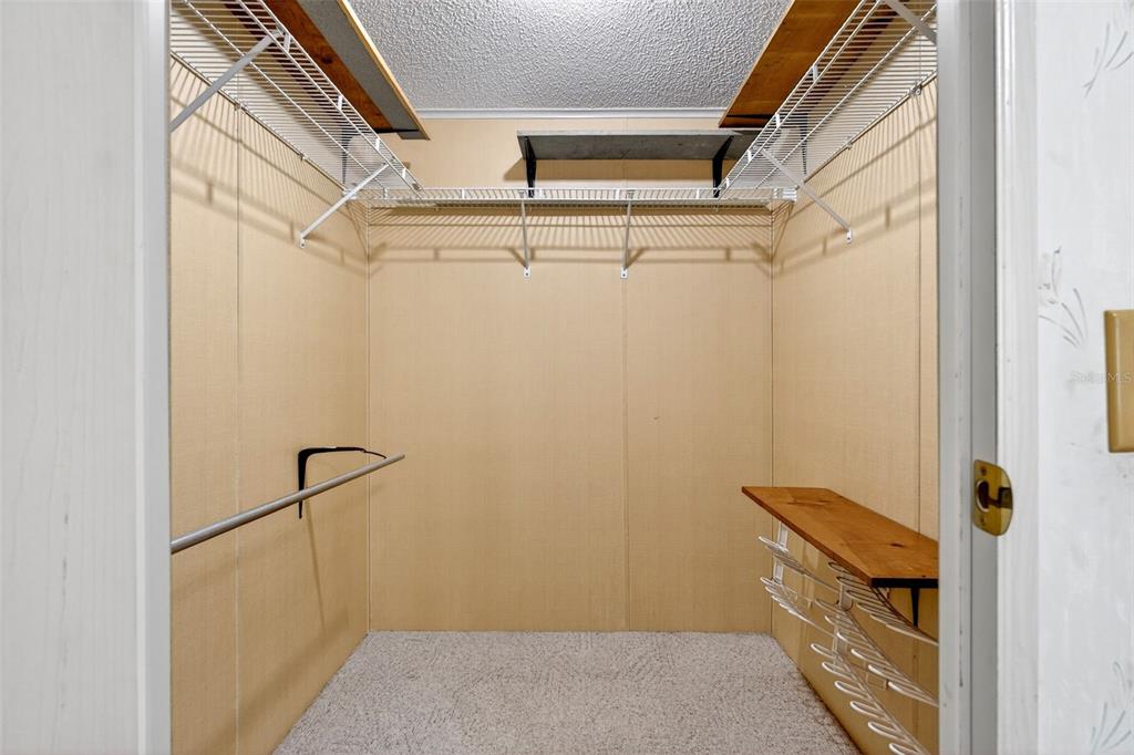 8046 Highpoint Boulevard Brooksville, FL 34613 - Photo 17 of 47 a bathroom with a shower and a sink