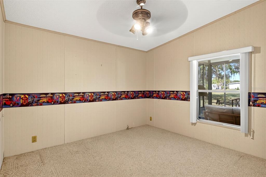 8046 Highpoint Boulevard Brooksville, FL 34613 - Photo 23 of 47 a view of an empty room