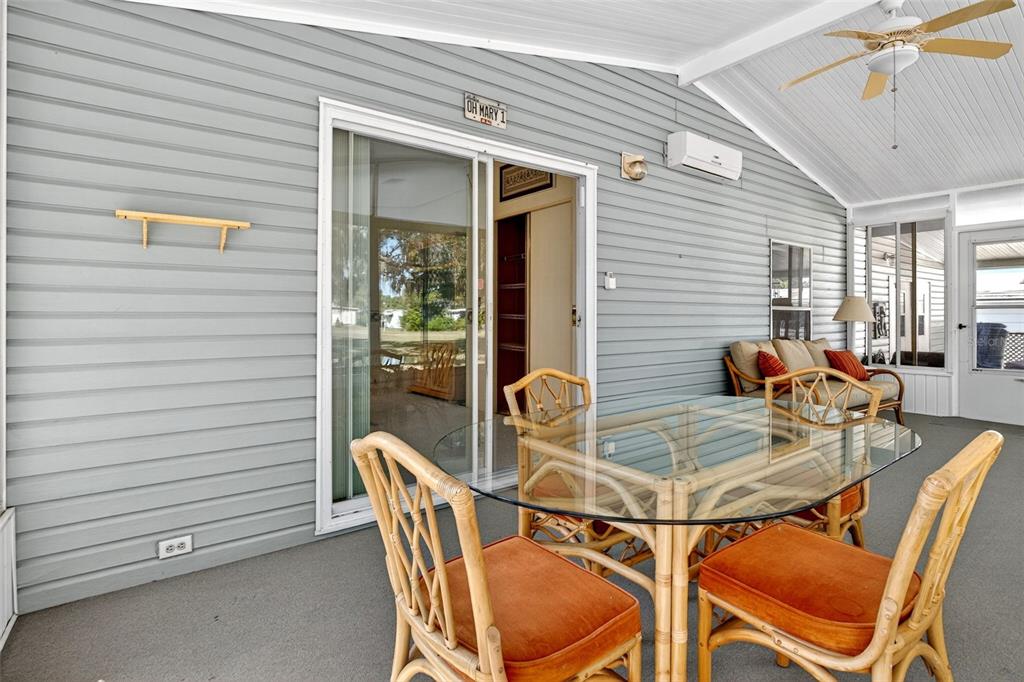 8046 Highpoint Boulevard Brooksville, FL 34613 - Photo 28 of 47 a view of a dining room with furniture