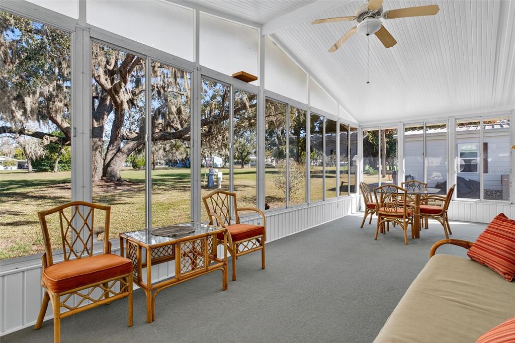 8046 Highpoint Boulevard Brooksville, FL 34613 - Photo 29 of 47 a outdoor space with furniture