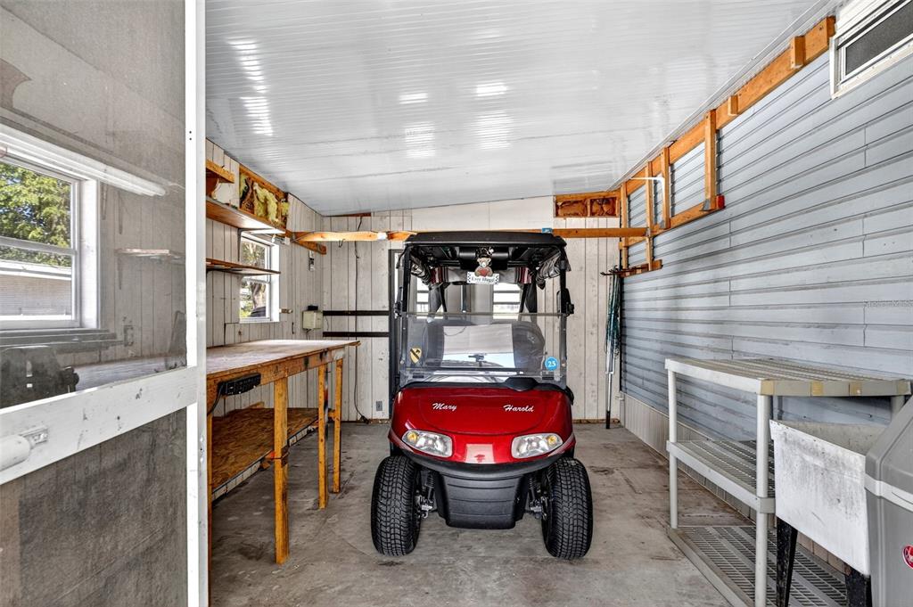 8046 Highpoint Boulevard Brooksville, FL 34613 - Photo 30 of 47 a room with furniture a sink and a window