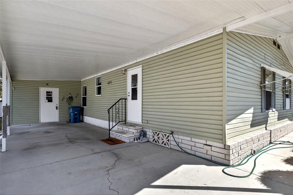 8046 Highpoint Boulevard Brooksville, FL 34613 - Photo 4 of 47 a view of a house with backyard