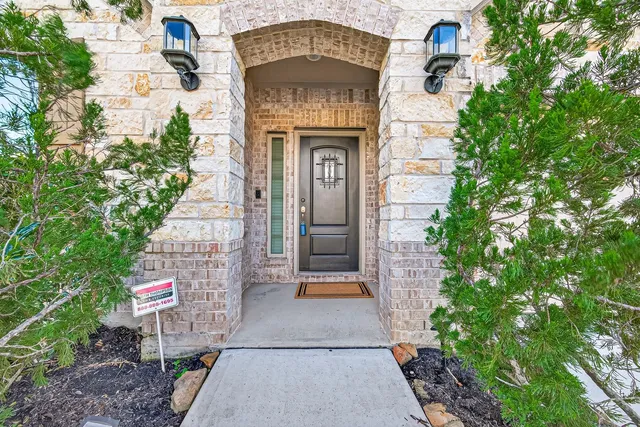a front view of a house with a door