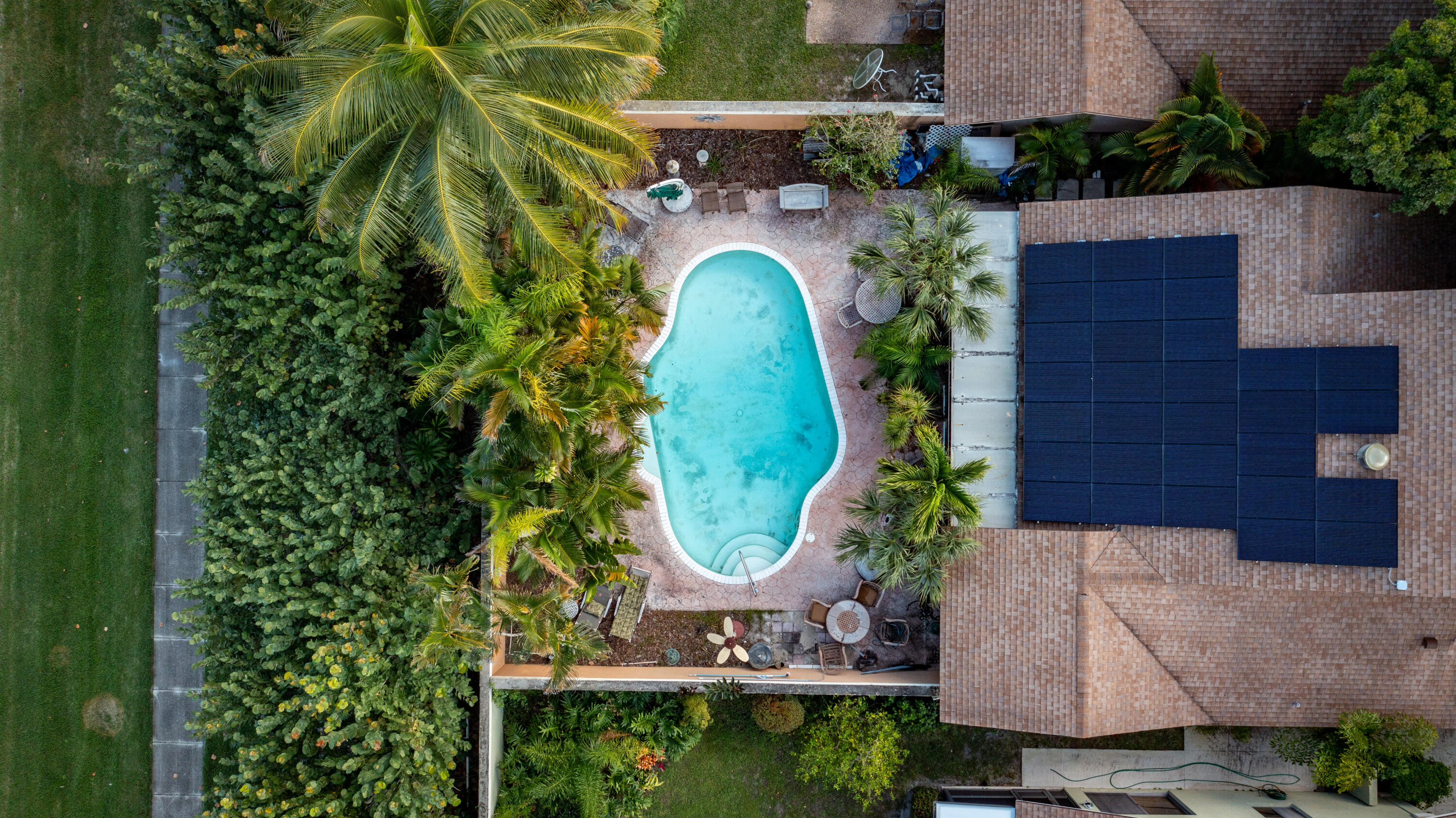 113 Seashore Drive Jupiter, FL 33477 - Photo 6 of 19 an aerial view of a house with outdoor space and a lake view