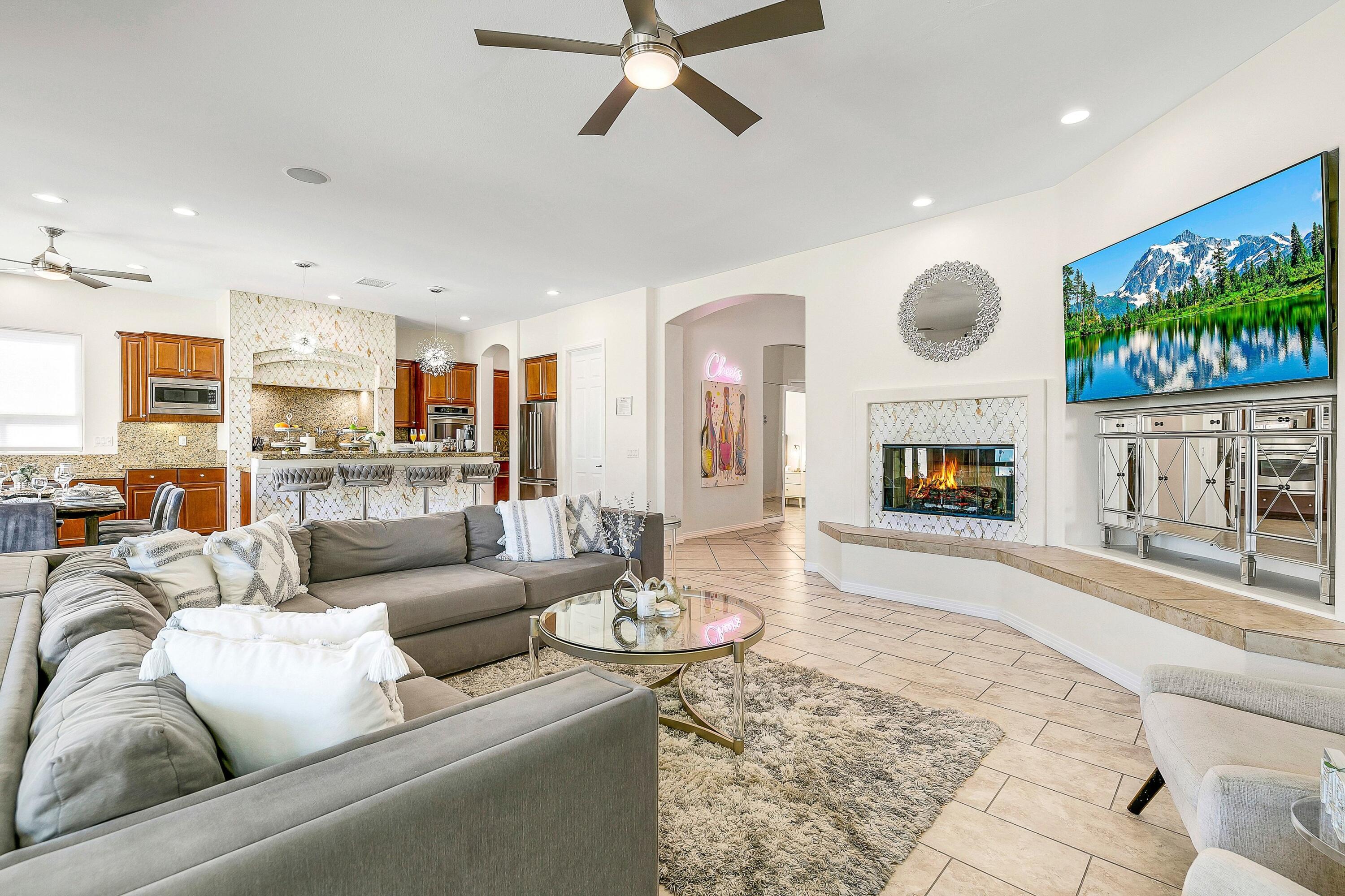 48678 Cascade Street Indio, CA 92201 - Photo 14 of 78 a living room with furniture and a flat screen tv
