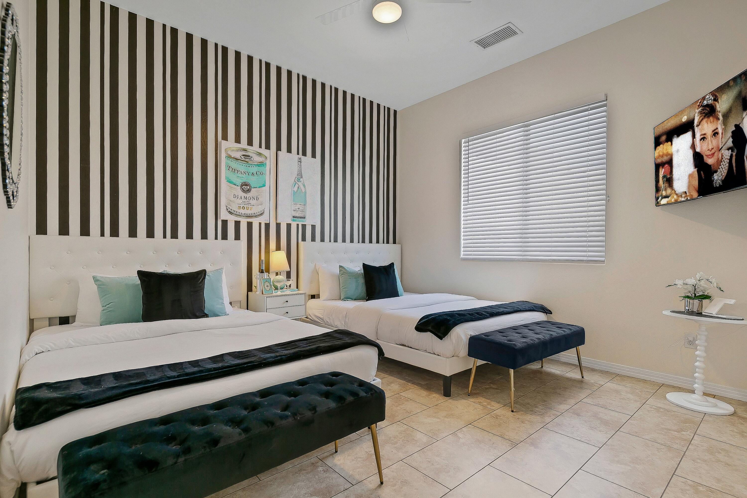 48678 Cascade Street Indio, CA 92201 - Photo 33 of 78 a bedroom with furniture and a fireplace