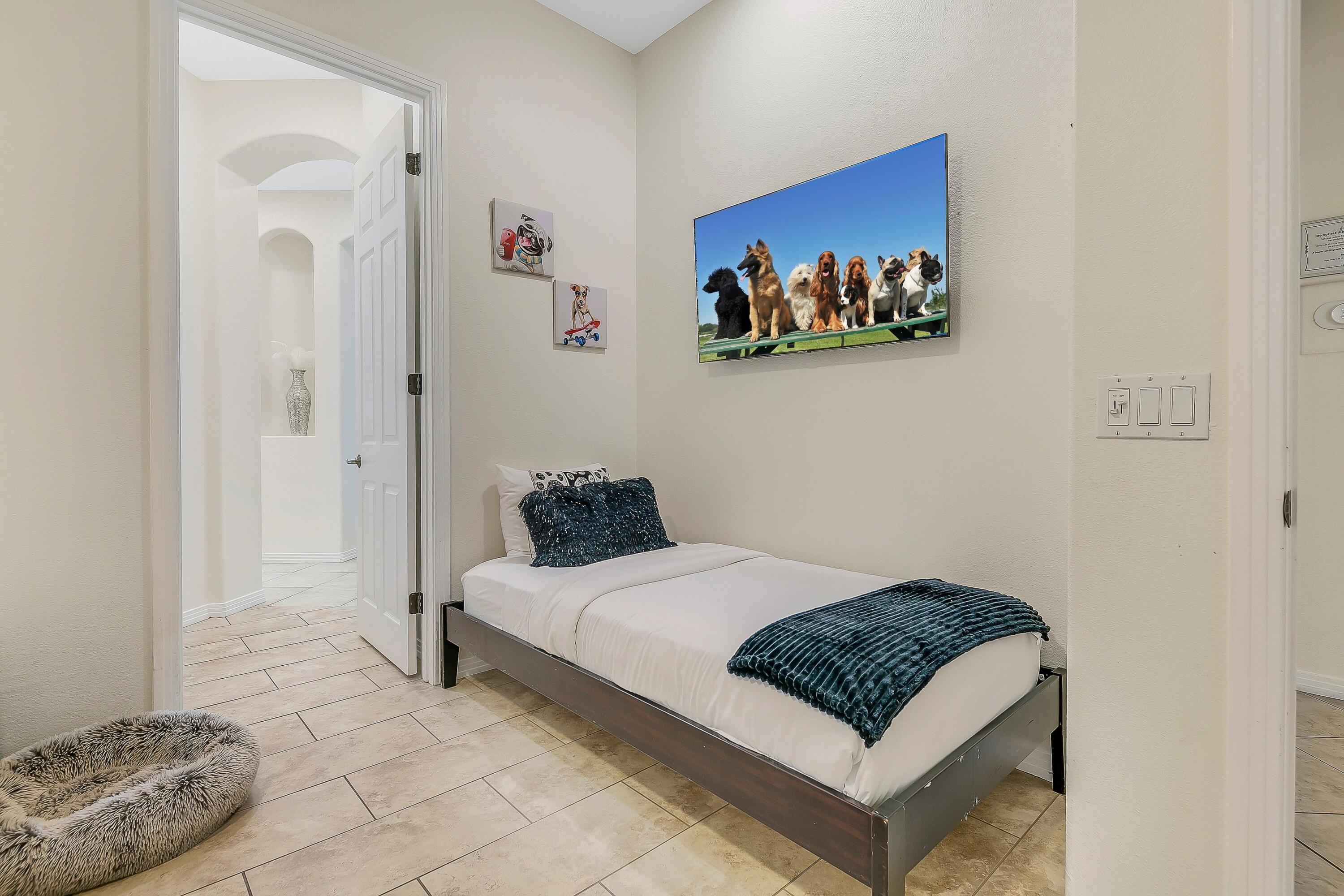 48678 Cascade Street Indio, CA 92201 - Photo 35 of 78 a bedroom with a bed and a painting on the wall