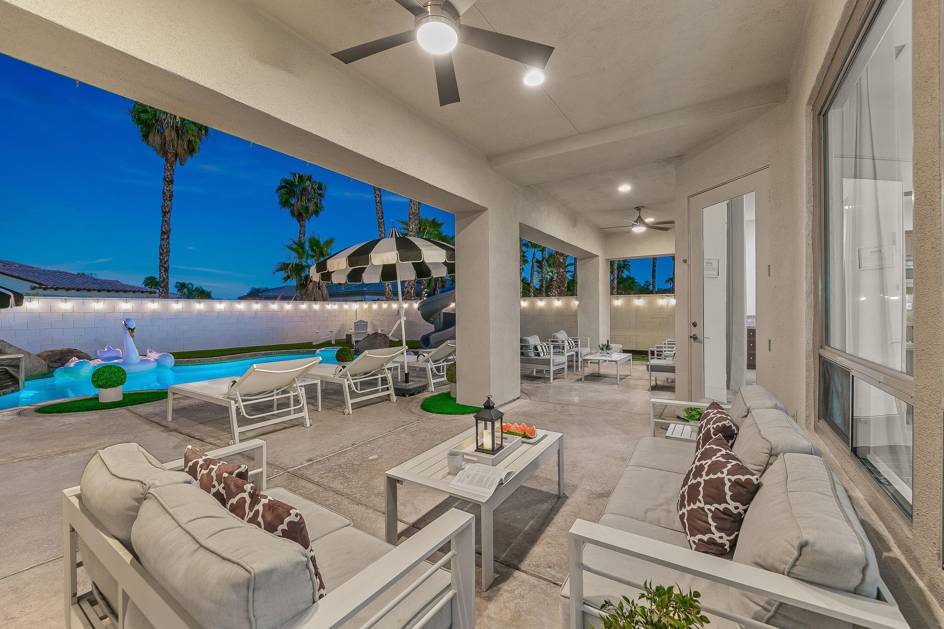 48678 Cascade Street Indio, CA 92201 - Photo 66 of 78 a living room with furniture and a large window