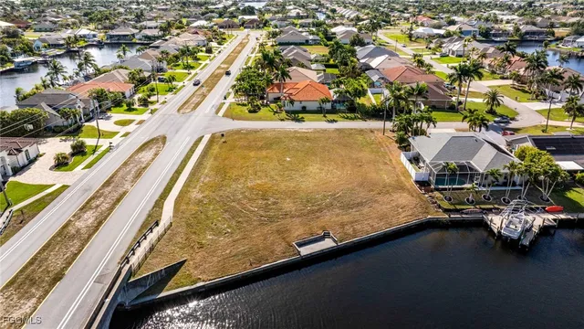 a view of a swimming pool with outdoor seating