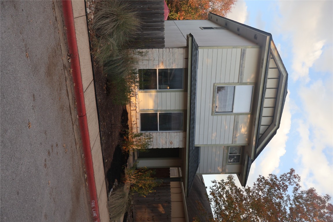 4523 Secure Lane Austin, TX 78725 - Photo 2 of 10 View of front of property featuring stone siding
