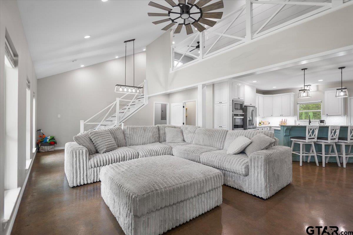 9235 Farm To Market Road 851 Rusk, TX 75785 - Photo 5 of 47 a living room with furniture and a chandelier