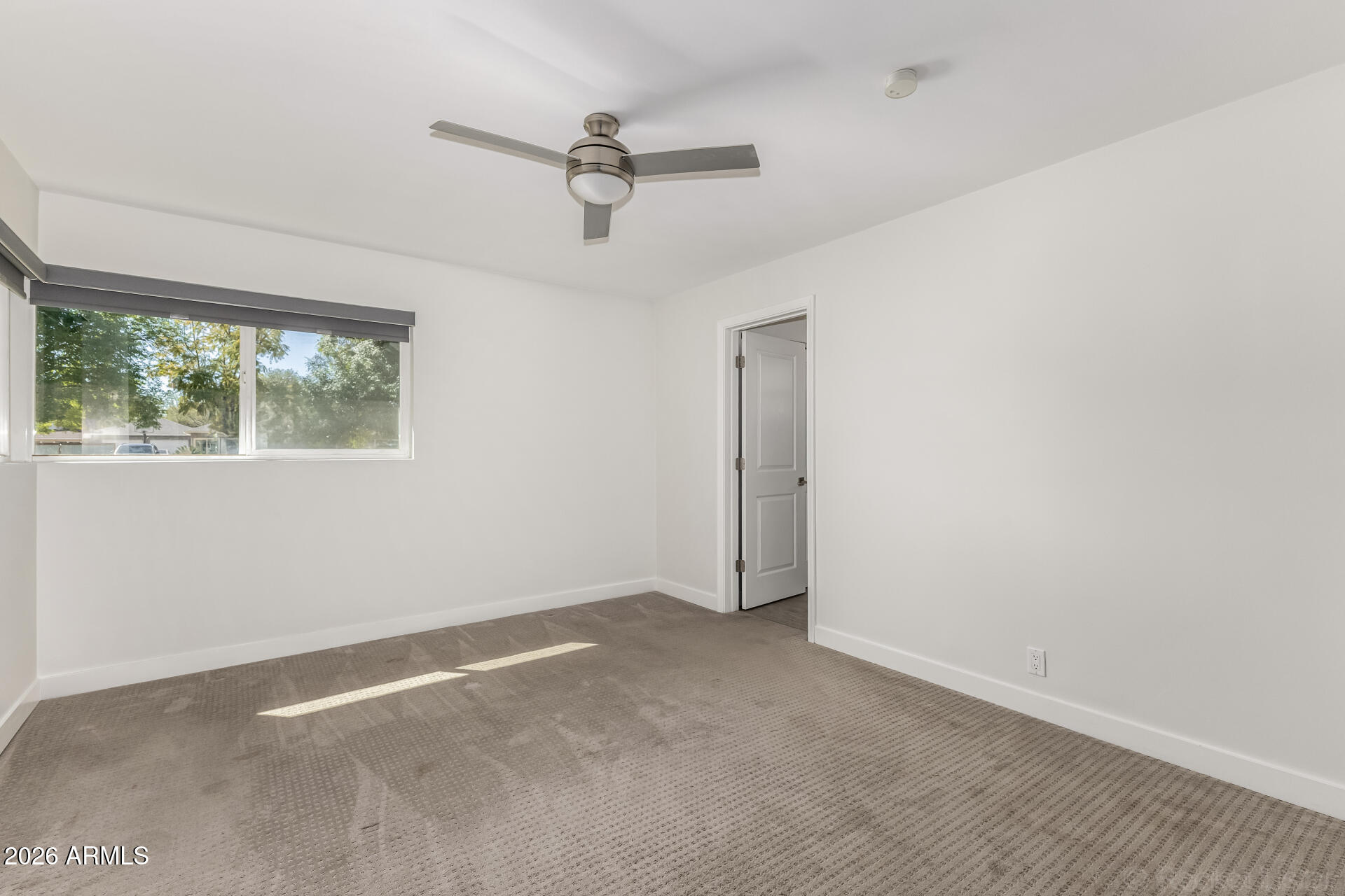 3930 East Oak Street Phoenix, AZ 85008 - Photo 32 of 61 a view of an empty room with a window