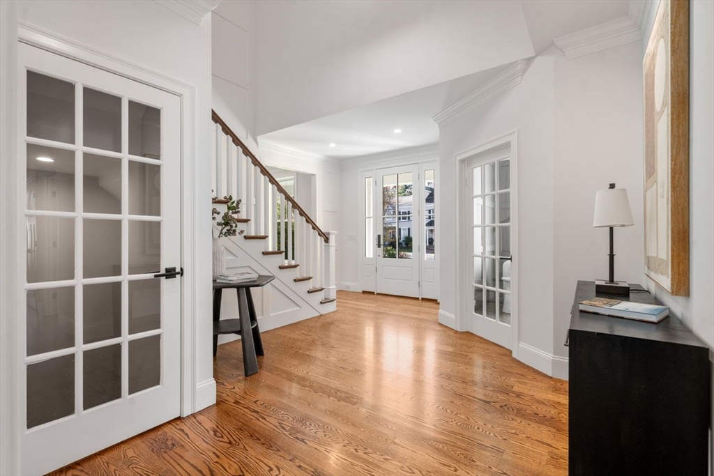 201 Lowell Road Wellesley, MA 02481 - Photo 26 of 41 a view of an empty room with wooden floor and a window