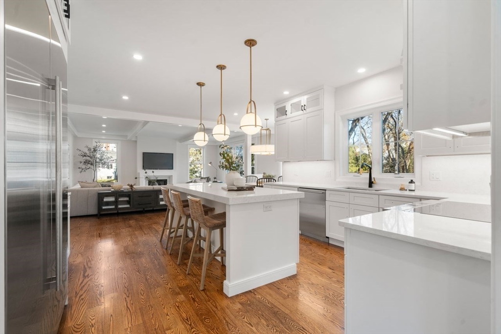 201 Lowell Road Wellesley, MA 02481 - Photo 31 of 41 a kitchen with a sink appliances and cabinets