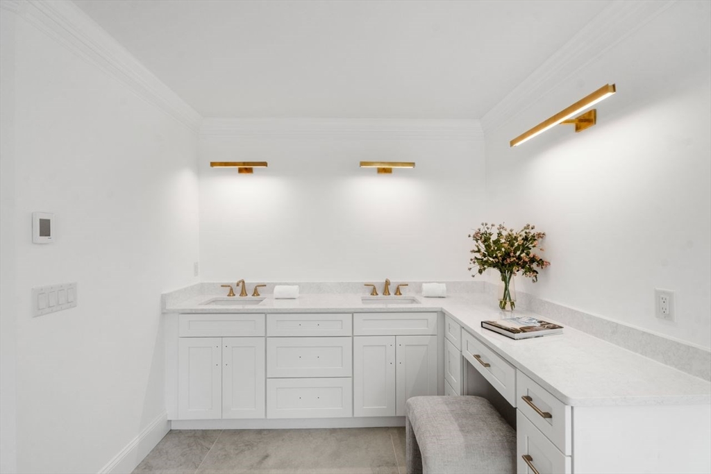 201 Lowell Road Wellesley, MA 02481 - Photo 41 of 41 a bathroom with a sink and a vanity