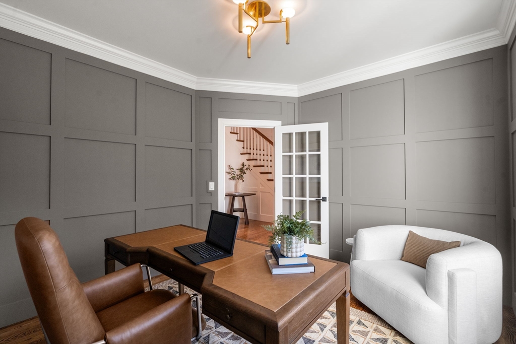 201 Lowell Road Wellesley, MA 02481 - Photo 5 of 41 a work room with furniture and a potted plant