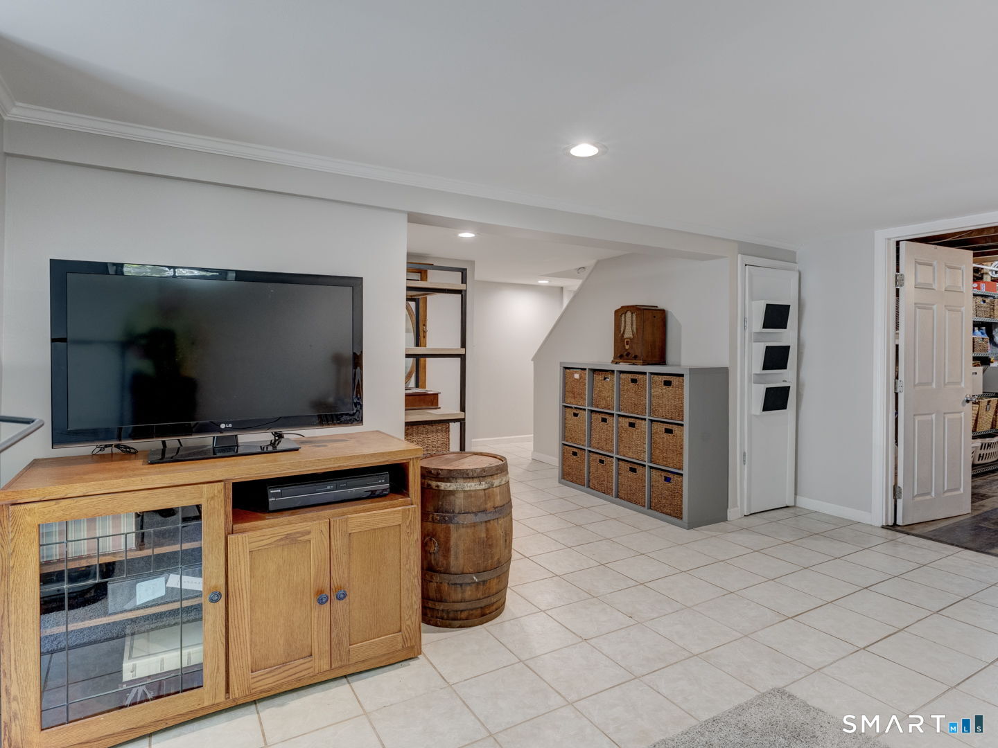 39 Freedom Drive Canton, CT 06019 - Photo 25 of 37 a room with furniture and flat screen tv