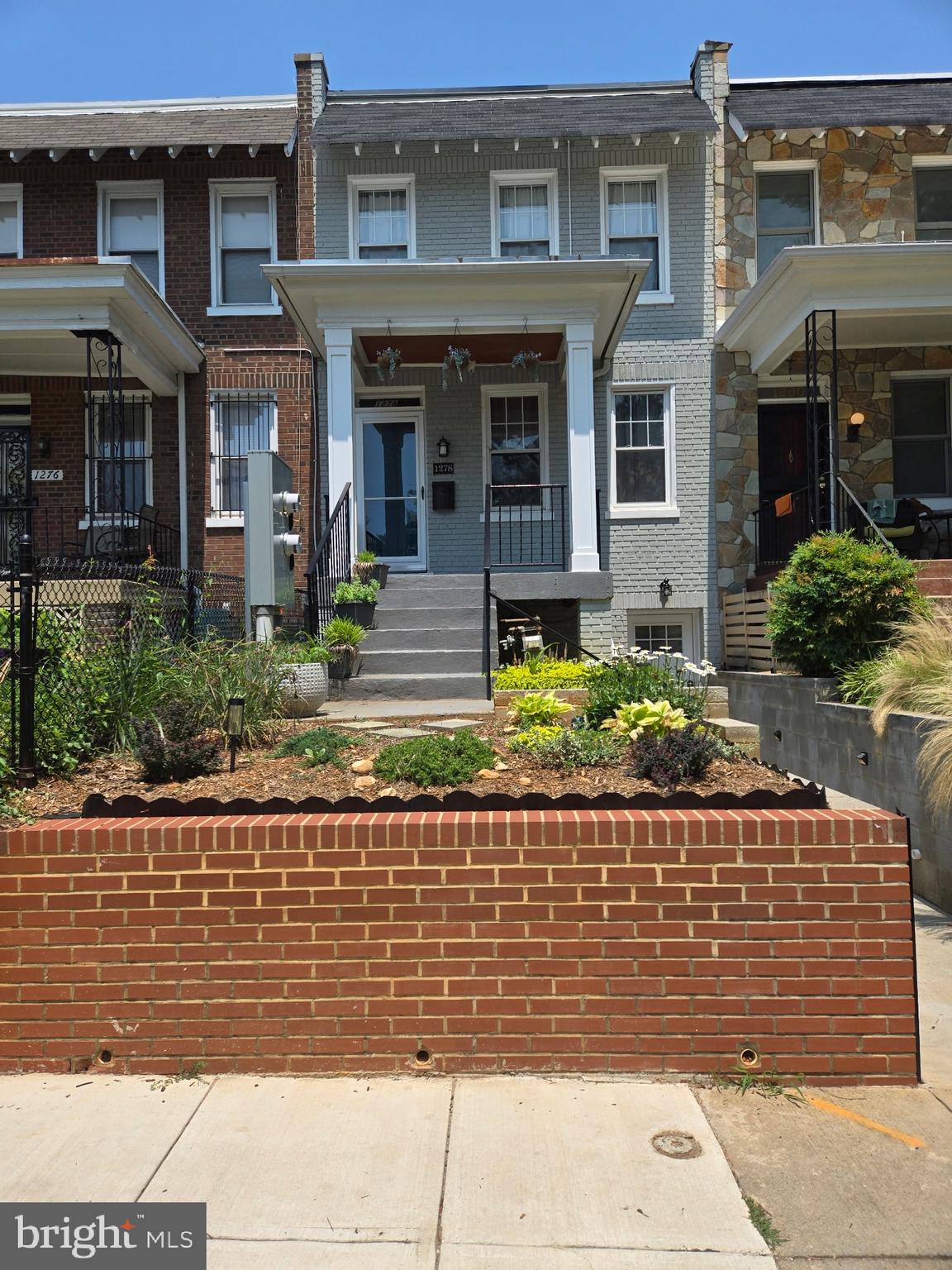 1278 Neal Street Northeast Washington, DC 20002 - Photo 1 of 22 a front view of a house
