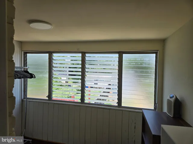 a view of a living room and hardwood floor