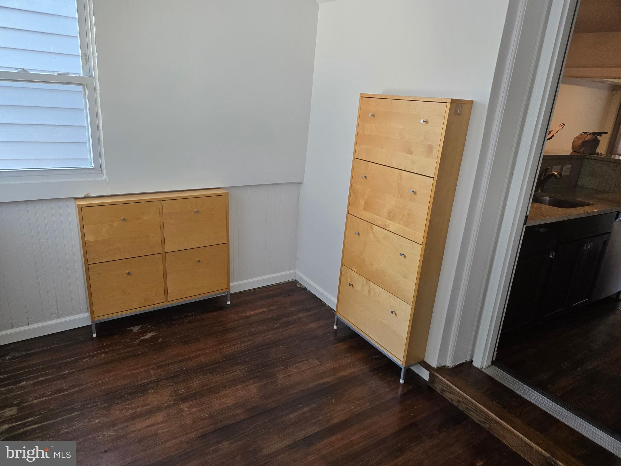 1278 Neal Street Northeast Washington, DC 20002 - Photo 5 of 22 an empty room with wooden floor