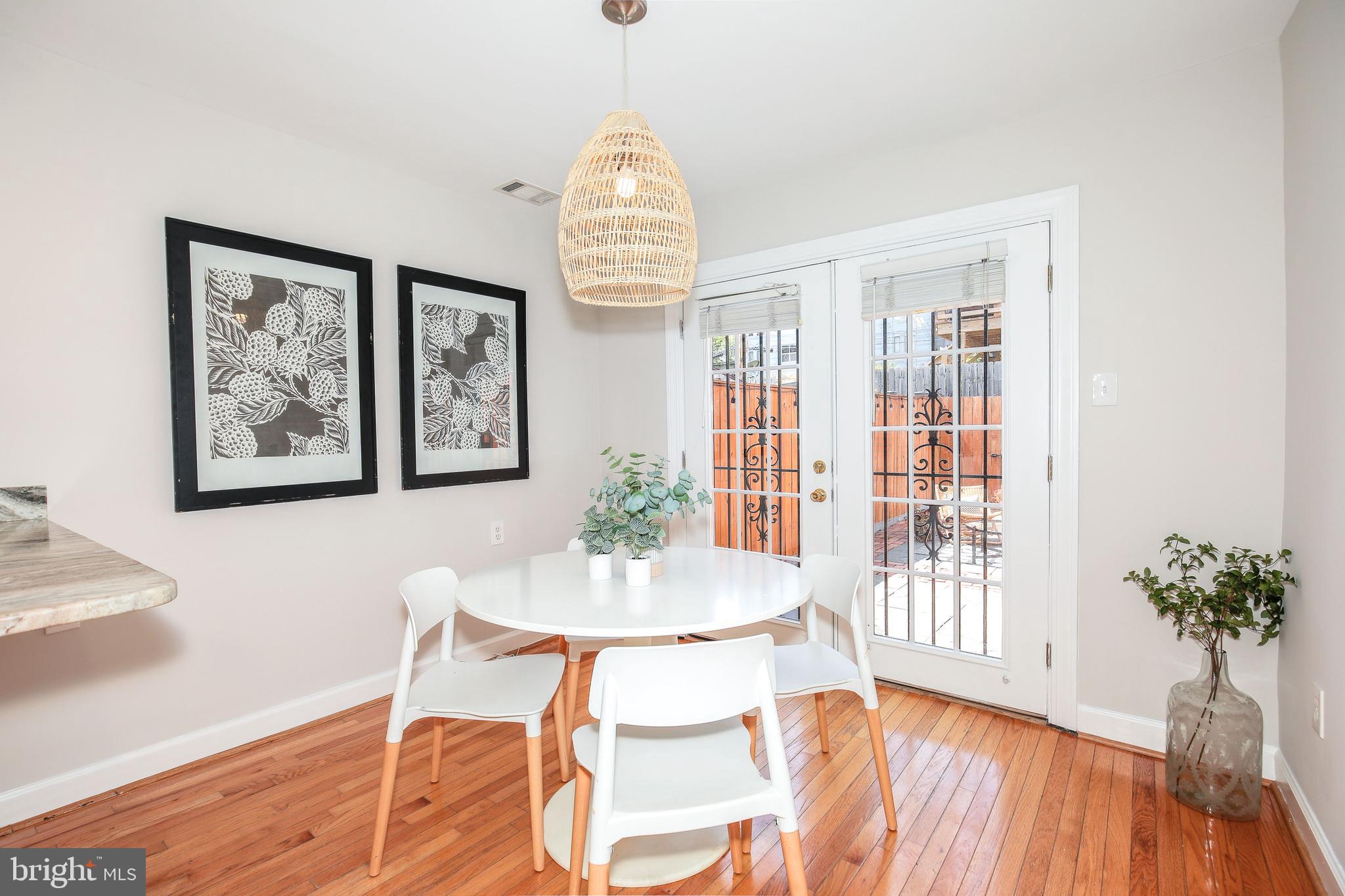 907 12th Street Southeast Washington, DC 20003 - Photo 10 of 24 Dining room steps out to patio