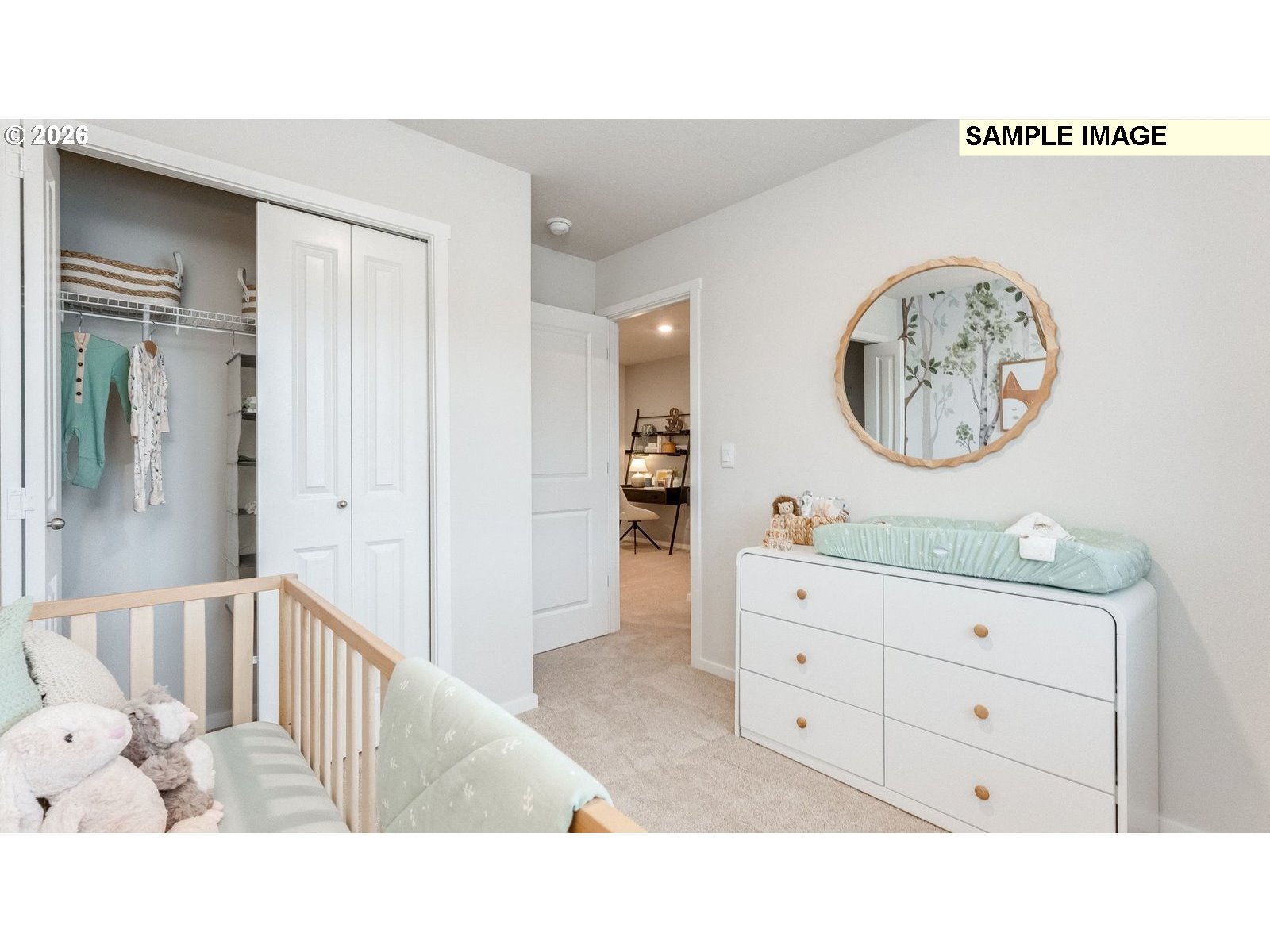 327 Coho Loop Woodland, WA 98674 - Photo 15 of 23 a hallway with a bed and a chandelier