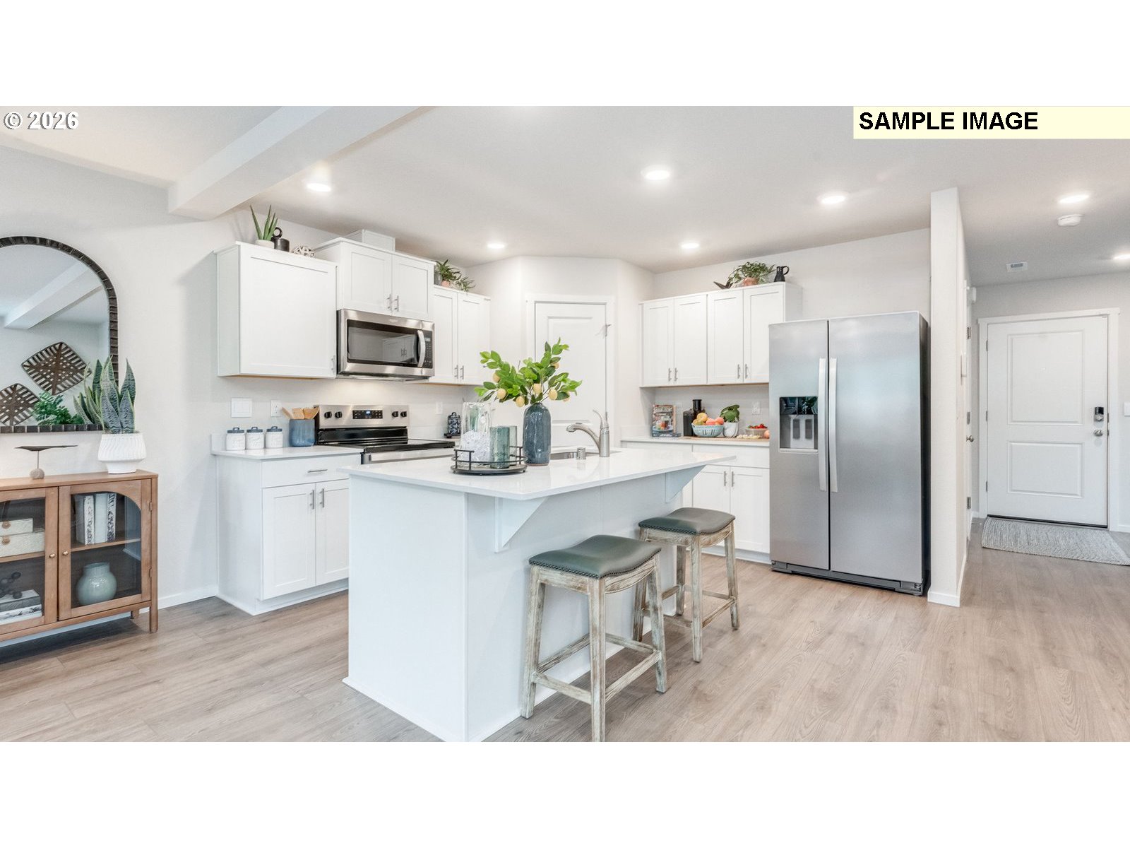 327 Coho Loop Woodland, WA 98674 - Photo 19 of 23 a kitchen with cabinets and stainless steel appliances