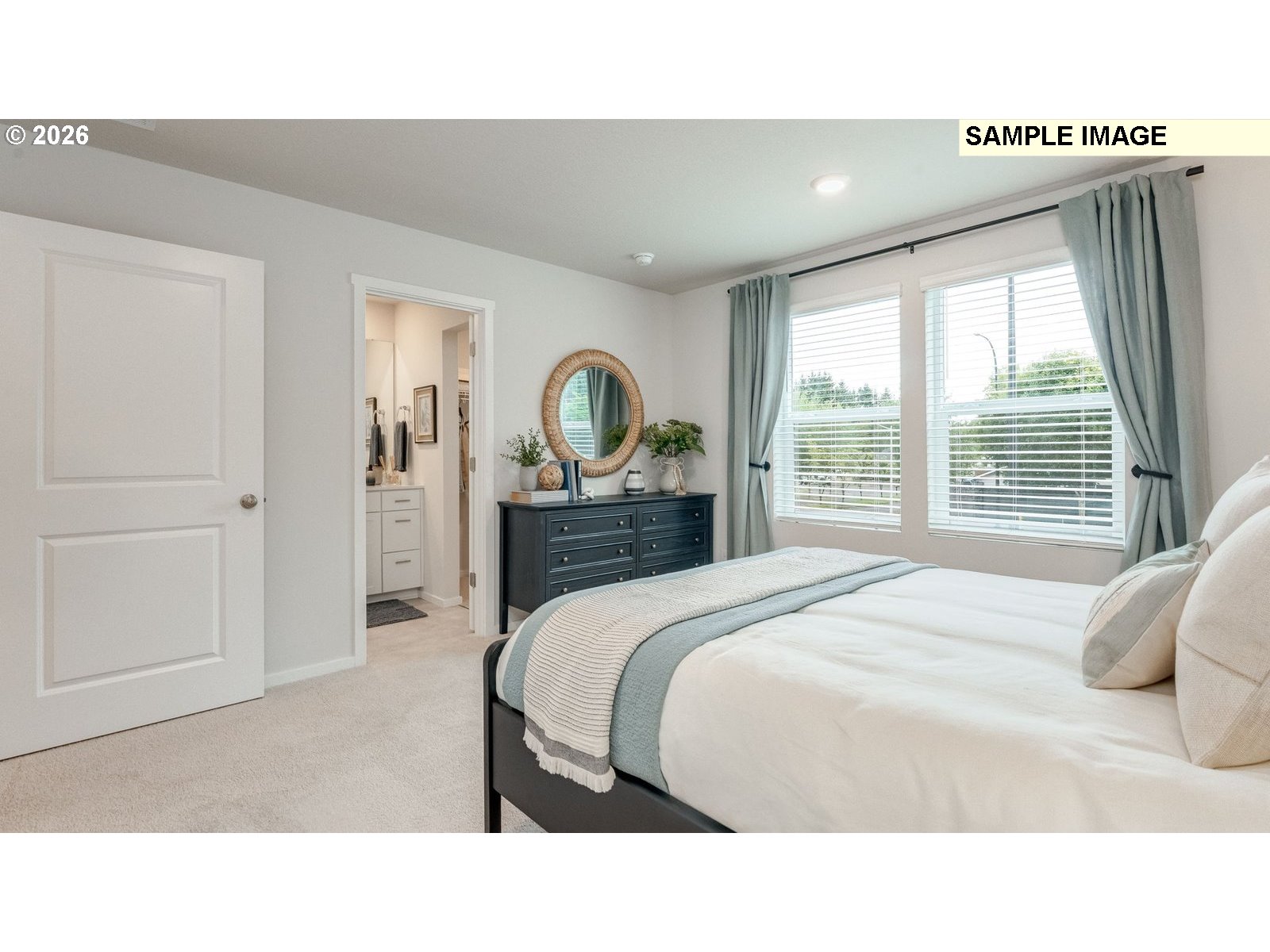 327 Coho Loop Woodland, WA 98674 - Photo 20 of 23 a bedroom with a bed and a dresser