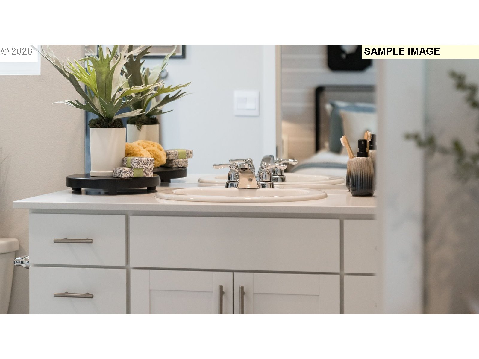 327 Coho Loop Woodland, WA 98674 - Photo 23 of 23 a bathroom with a sink a mirror and vanity