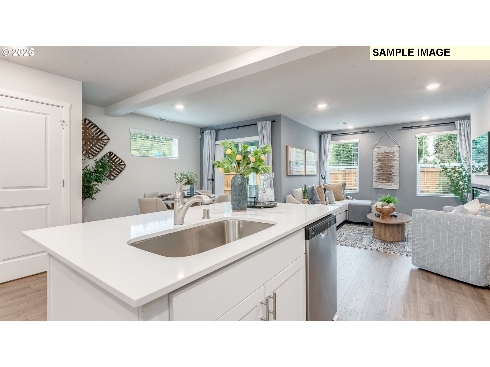 327 Coho Loop Woodland, WA 98674 - Photo 6 of 23 a kitchen with a sink and a refrigerator