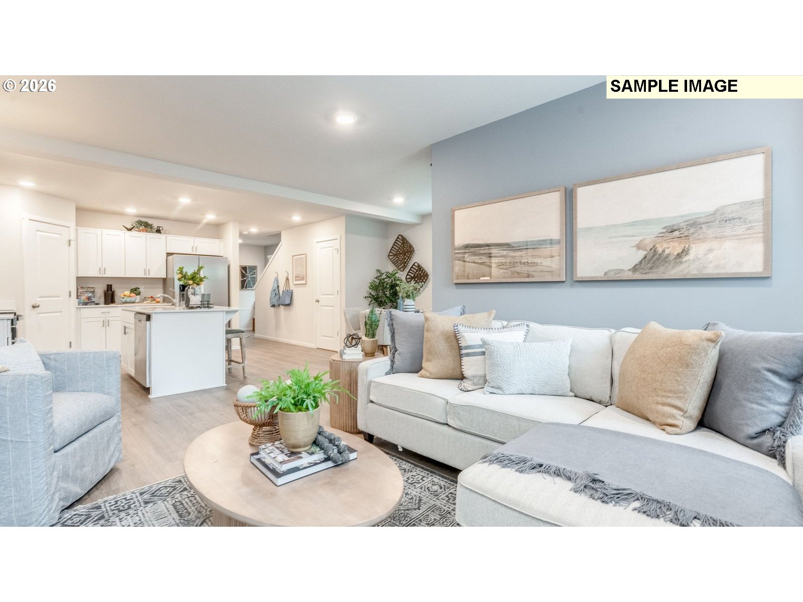 327 Coho Loop Woodland, WA 98674 - Photo 10 of 23 a living room with furniture white walls and a dining table