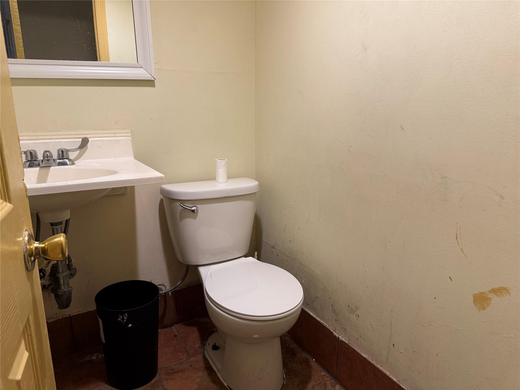 35-46 92nd Street Queens, NY 11372 - Photo 8 of 10 a bathroom with a toilet and a sink