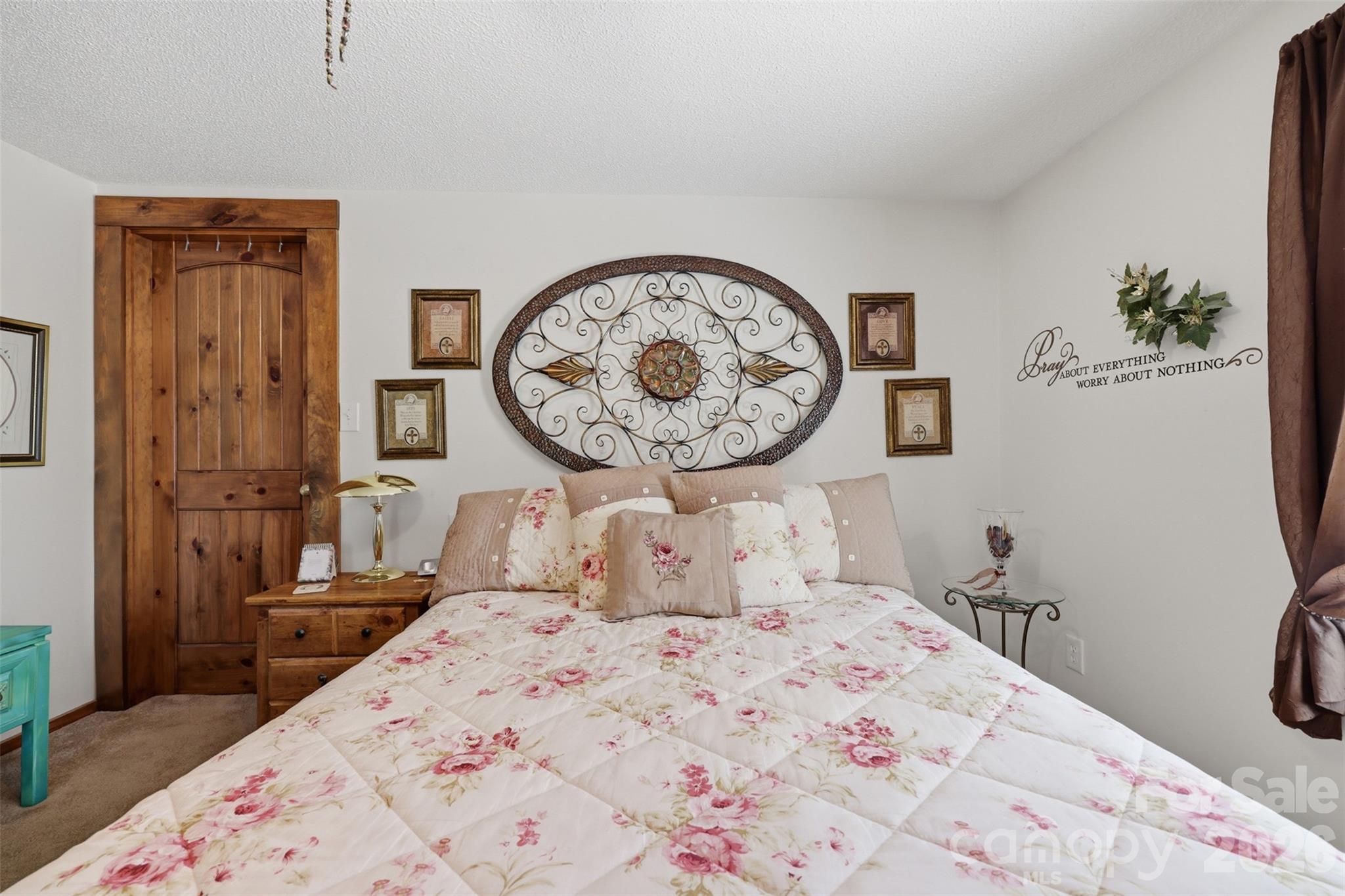 176-174 Oak Hollow Road Union Grove, NC 28689 - Photo 25 of 48 a bedroom with a bed and a lamp on dresser