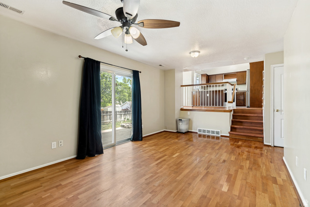 843 Deer Flat Road Tooele, UT 84074 - Photo 10 of 27 Open concept living space with wood-finish flooring