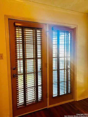 a view of a balcony and window